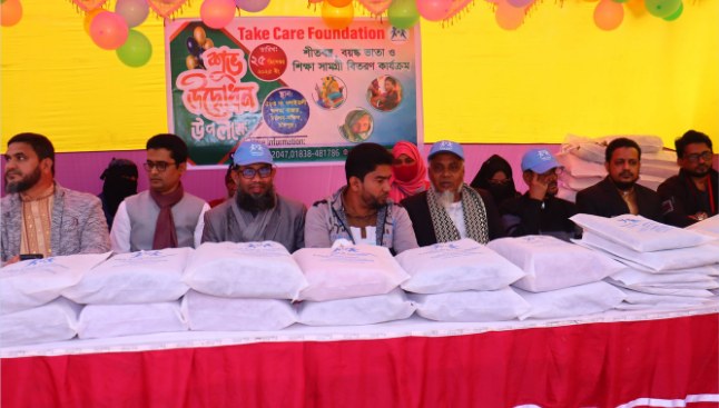 Stage at the opening day with bags of relief items